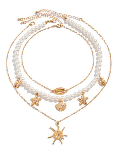 Bella Women's Necklace Set featuring imitation pearls with a vintage nautical design, perfect for adding a touch of elegance to any outfit. 1
