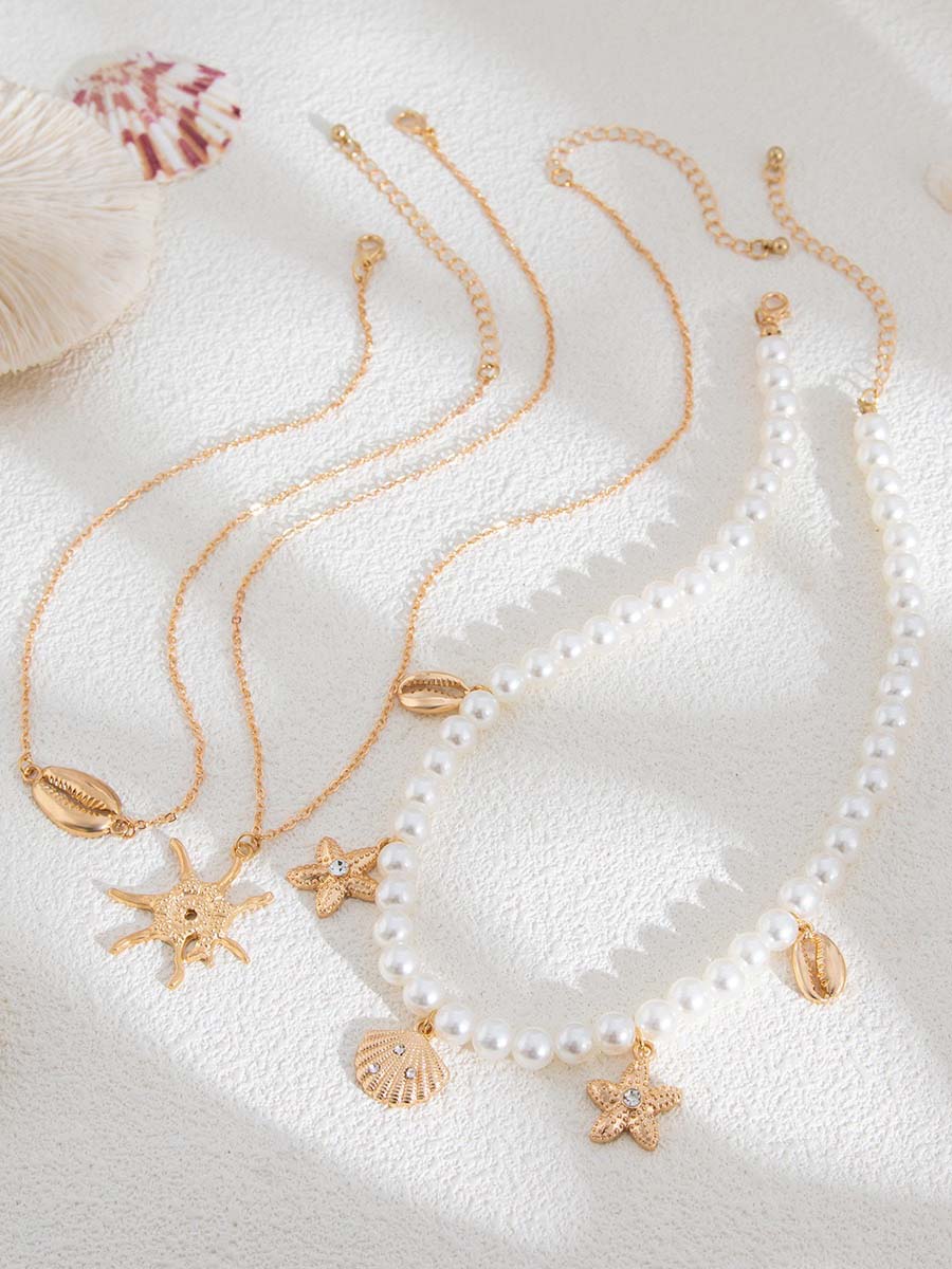 Bella Women's Necklace Set featuring imitation pearls with a vintage nautical design, perfect for adding a touch of elegance to any outfit. 2