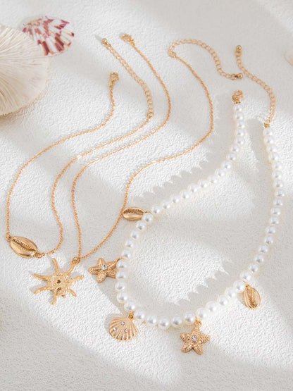 Bella Women's Necklace Set featuring imitation pearls with a vintage nautical design, perfect for adding a touch of elegance to any outfit. 2