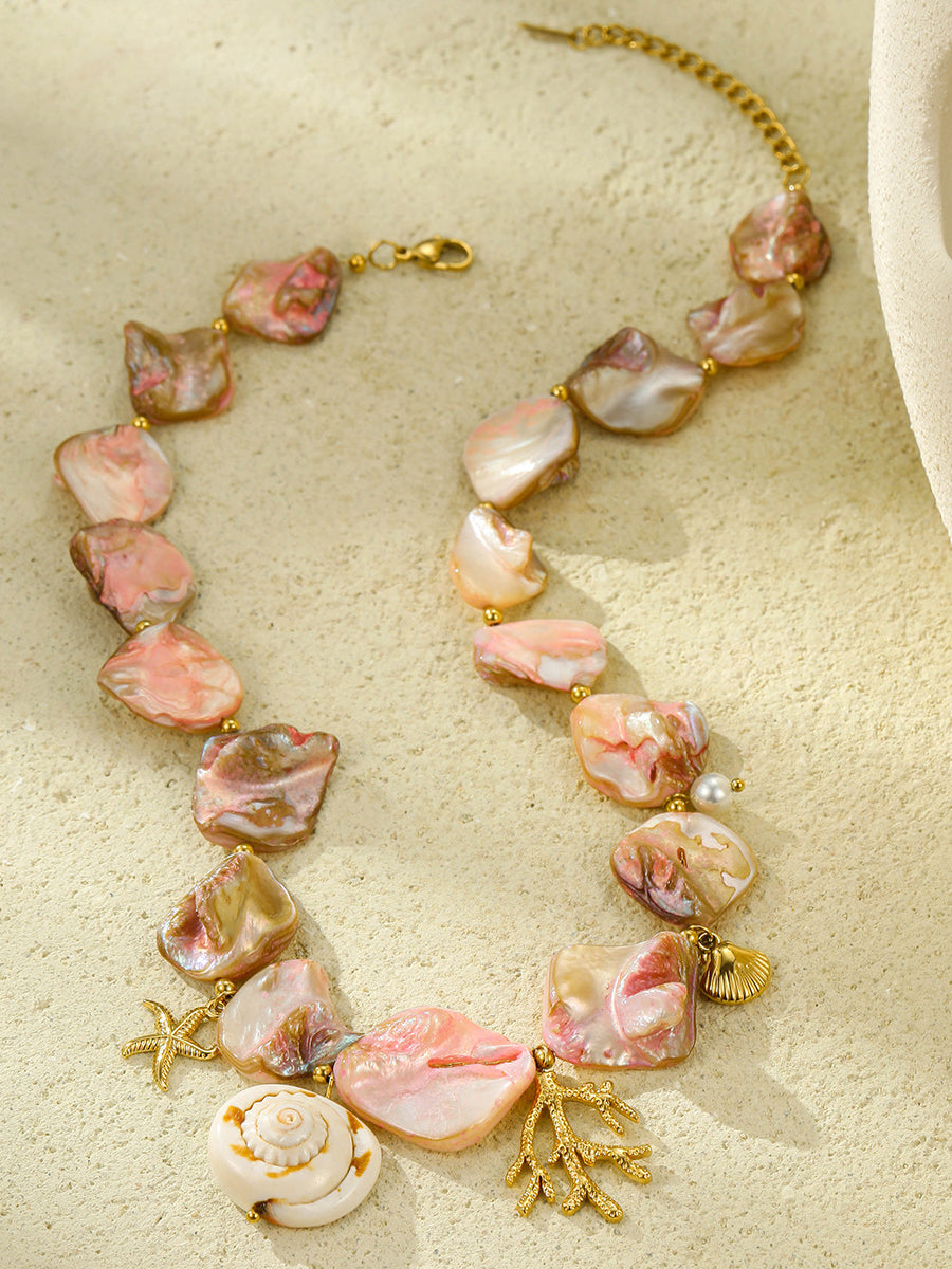 Bella Women's Necklace featuring a stunning pink shell and coral design, perfect for adding a touch of elegance to any outfit. 1