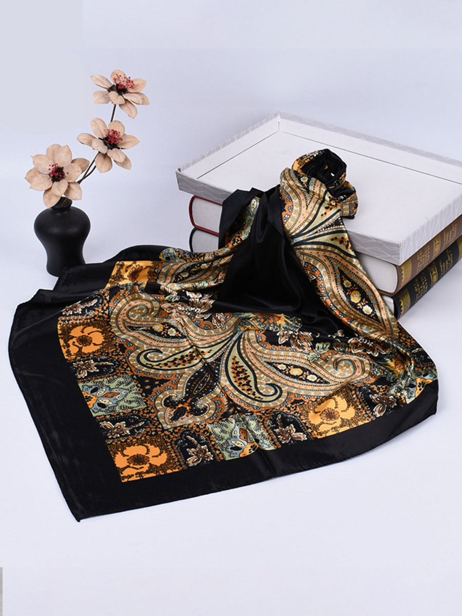 Bella Women's Square Scarf featuring a vibrant paisley print in rich colors, perfect for adding a stylish touch to any outfit. 0
