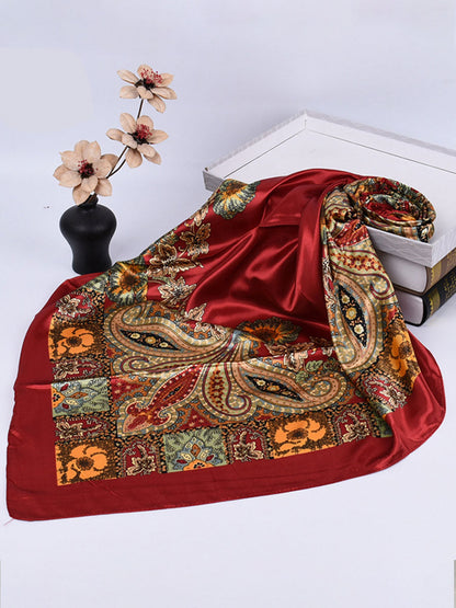Bella Women's Square Scarf featuring a vibrant paisley print in rich colors, perfect for adding a stylish touch to any outfit. 1