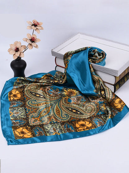Bella Women's Square Scarf featuring a vibrant paisley print in rich colors, perfect for adding a stylish touch to any outfit. 4