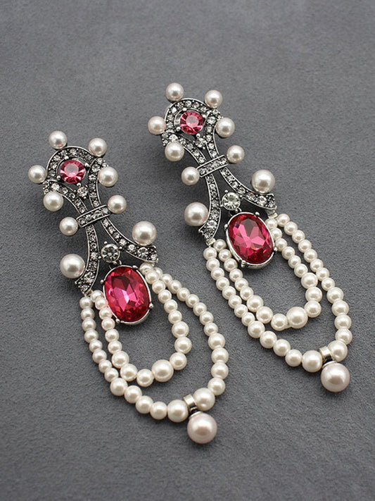 "Rita Women's Earrings featuring a stunning ruby and pearl tassel design, perfect for adding elegance to any outfit." 0