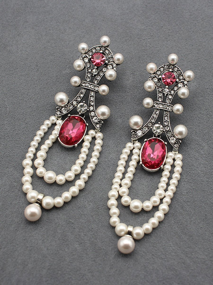 "Rita Women's Earrings featuring a stunning ruby and pearl tassel design, perfect for adding elegance to any outfit." 1