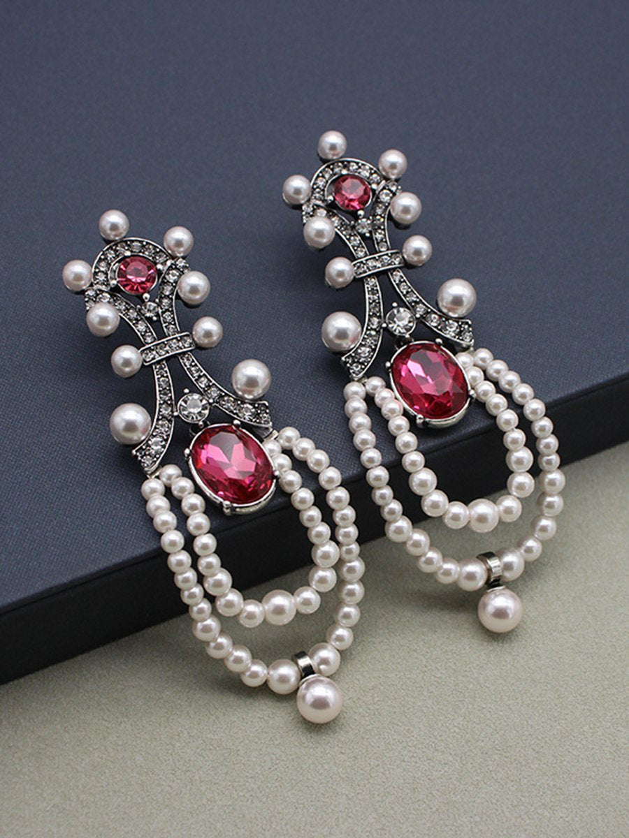 "Rita Women's Earrings featuring a stunning ruby and pearl tassel design, perfect for adding elegance to any outfit." 2