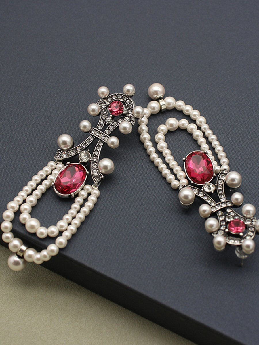 "Rita Women's Earrings featuring a stunning ruby and pearl tassel design, perfect for adding elegance to any outfit." 3