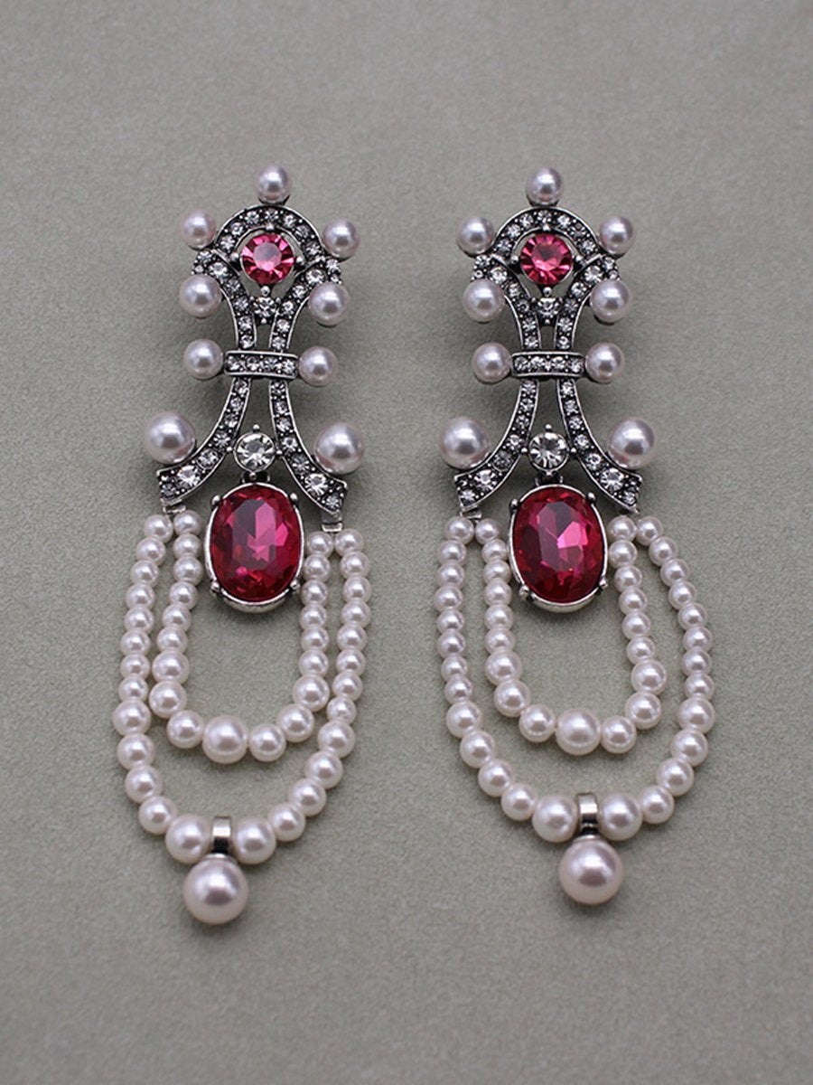 "Rita Women's Earrings featuring a stunning ruby and pearl tassel design, perfect for adding elegance to any outfit." 4