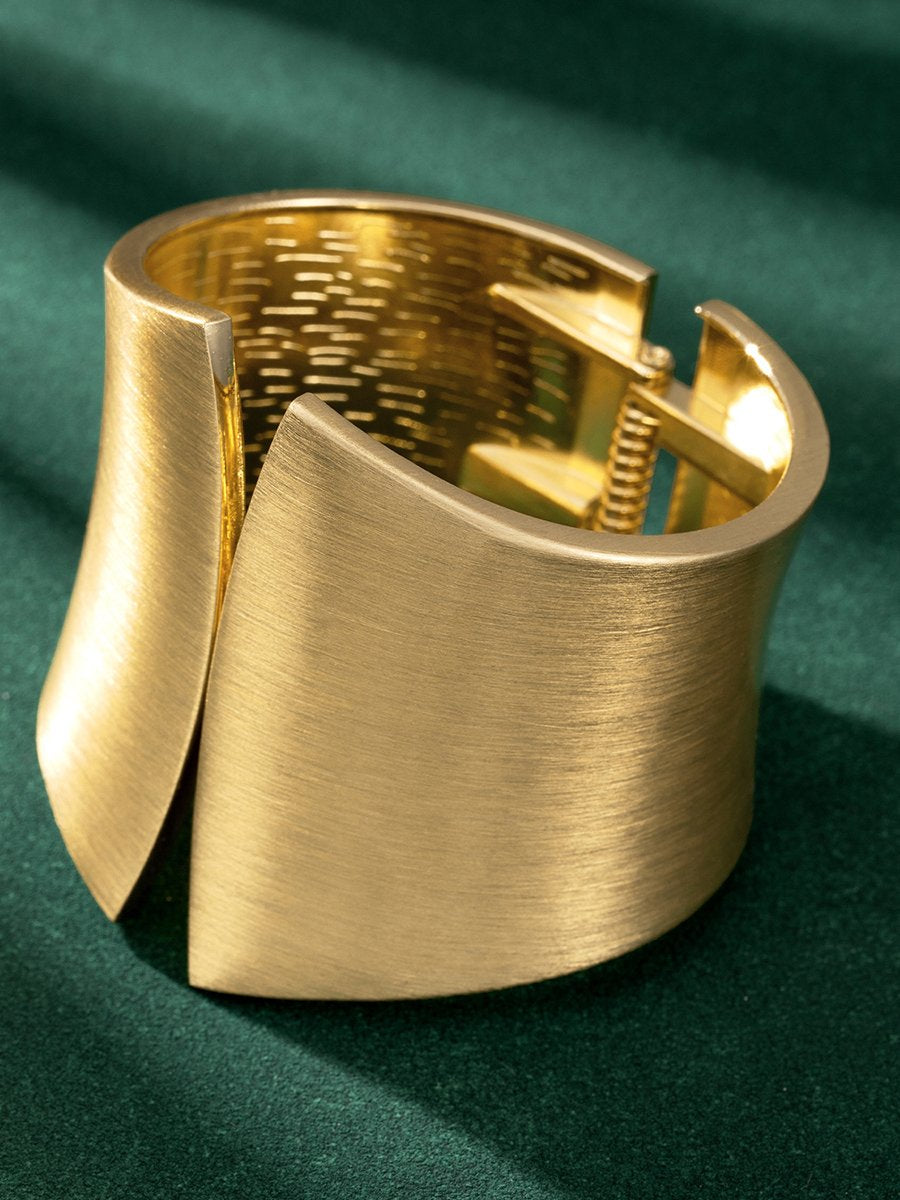 Vera Women's Bracelet featuring a brushed metal finish and a vintage-inspired wide band design, perfect for adding a touch of elegance to any outfit. 0